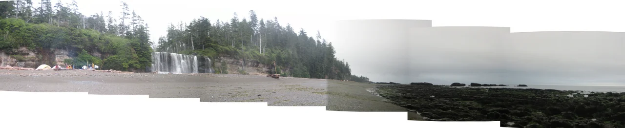A panorama of the Tsusiat Falls campground on the West Coast Trail, tide out, on an overcast day in August 2007. Pics taken and stitched together by me (Burtonpe).