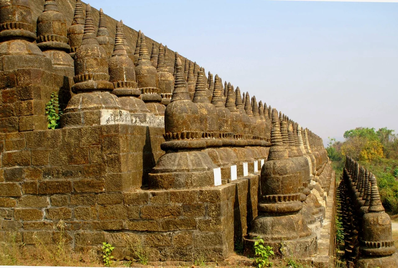 This temple situated near the city of Mrauk U, 2km East, was built between 1553 and 1556 by King Dikkha, the son of King Min Bin when the Kingdom was prosperous ...
The name Paya Koe Thaung , means 'Temple of 90,000 Buddha Images'
Each little Stupa is representative of the Buddha's Image